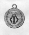 Медаль «За усердие и помощь» с вензелевым изображением Высочайшего Имени